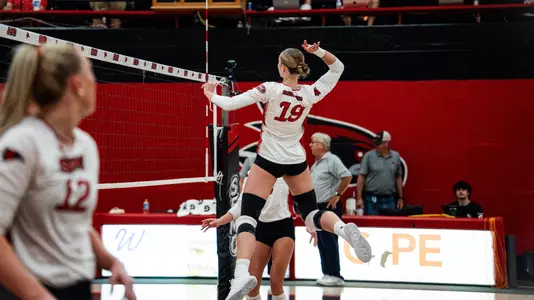 Jacey Young attacks the ball looking for a kill