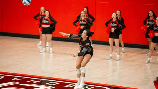 Nina Schuberth follow through on her serve
