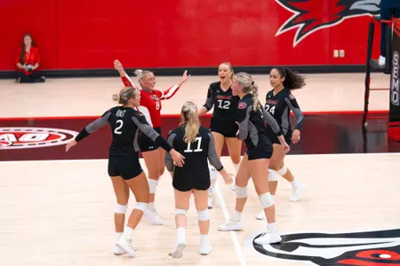 Volleyball team celebrates a point