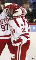 Lawrence celebrates after scoring the game-tying goal in an eventual 5-4 comeback win over Vermont in the national semifinals.