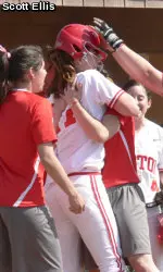 The team celebrates Roesch's walk-off grand slam.