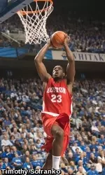 Senior John Holland finishes with game-high 27 points and eight rebounds.