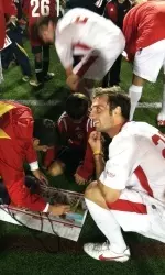 Men's soccer team sign autographs during Sportsmanship Day