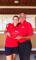 Sophomore Kristyna Pavlickova with head coach Bruce Chalas after her win at the Bucknell Invitational.