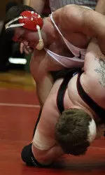 Junior Kevin Innis earned an 8-3 win in the heavyweight match.