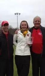 Sophomore Kristyna Pavlickova poses with head coach Bruce Chalas and mental conditioning coach Val Altieri after Friday's victory.