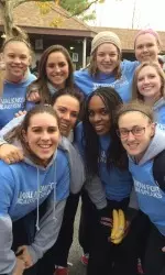 Members of the women's basketball team and men's hockey team volunteered on Sunday at the 14th annual Walk Now for Autism Speaks event