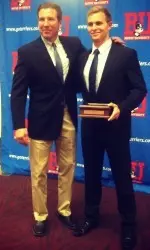 Head men's rowing coach Thomas Bohrer with E. Ray Speare Award winner Moritz Franz