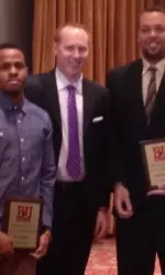 Assistant coach Shaun Morris presented seniors D.J. Irving and Dom Morris with co-MVP awards.