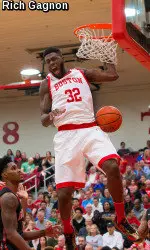 Senior Justin Alston slams home two of his 15 points on Friday night.