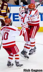 The Terriers celebrate Rodrigues' late winner.