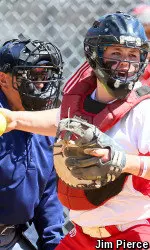 Freshman Alex Heinen went 3-of-7 with an RBI double and caught senior Melanie Russell's shutout.