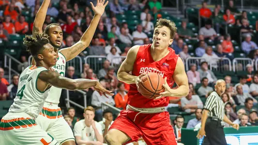 Max Mahoney drives toward the hoop at Miami
