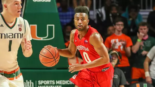 Eric Johnson dribbles the ball up the court at Miami