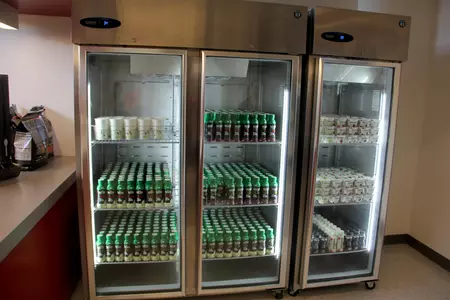 Photo of three stocked Refrigerators inside the Terrier Fueling Station