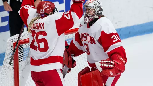 Connor Galway and Corinne Schroeder celebrate a 3-0 win over Vermont