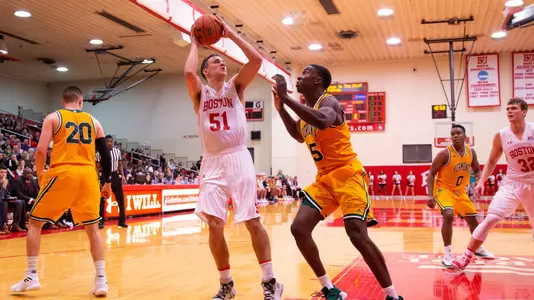 Max Mahoney attempts a jumper from the baseline against Vermont.