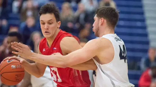 Max Mahoney is guarded by a Wildcat