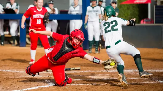 Alex Heinen tag at plate against Michigan State