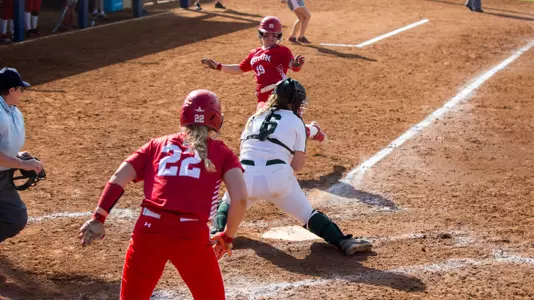 Emily Morrow sliding into home plate