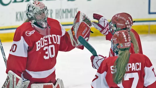 Corinne Schroeder, Abby Cook and Breanna Scarpaci celebrate a win
