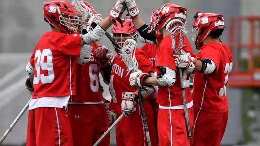 Men's Lacrosse Team celebrates a goal