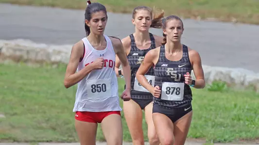 Corinne Batsu running with a Florida State harrier