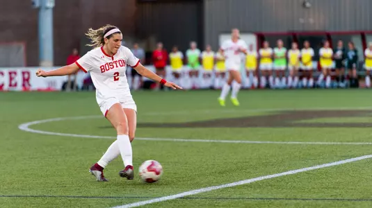 Ashley Buck kicks the ball.