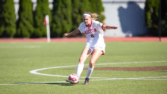 Ashley Buck kicks the ball.