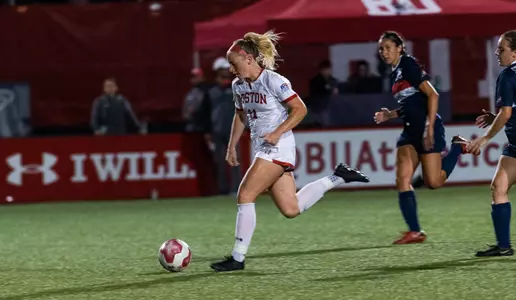 Caitlyn DiSarcina runs after the ball.