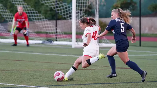 Jenna Oldham takes a shot.