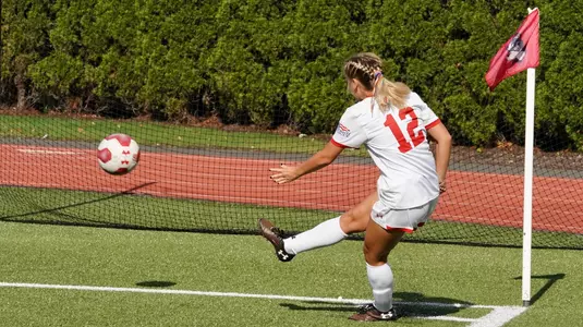 Kelly Park kicks the ball.