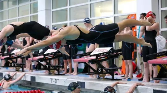 Ashlyn Carroll jumping off the starting block