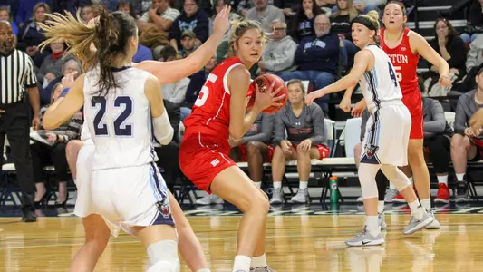 Mackenzie Miers holding the ball looking to pass