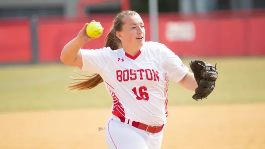 Ali DuBois is about to throw the ball to first for a force out.