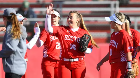 Ali DuBois high fives teammates