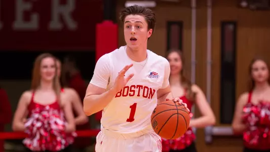 Garrett Pascoe brings the ball up the court vs. Vermont.