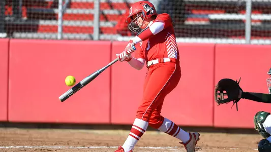 Madi Killebrew makes contact with the ball.