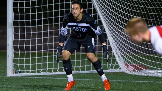 Mike Bernardi guards the goal.