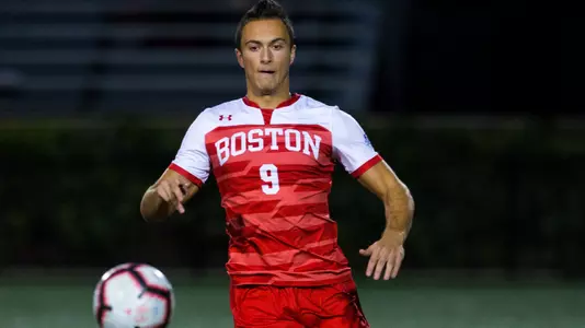 Austin D'Anna chases after the ball.