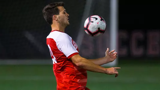 David Riccio bounce the ball off his chest to maintain possession.