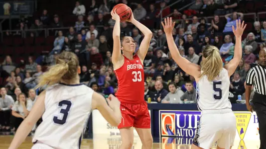 Maren Durant looking to pass the ball
