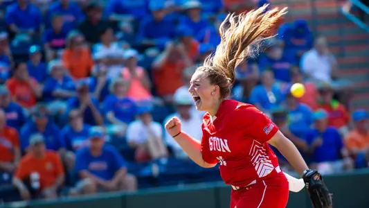 Ali DuBois lets out a big scream while jumping up in the air at the University of Florida during the 2019 NCAA Regionals.