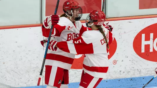 Jesse Compher and Courtney Correia celebrate a goal