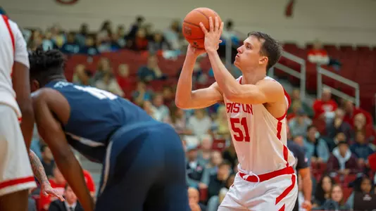 Max Mahoney attempts free throw against New Hampshire.