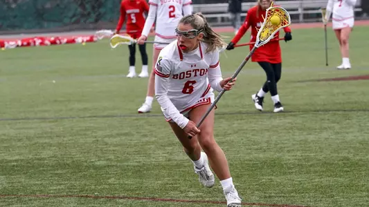 Maddie MacMaster looking to pass the ball