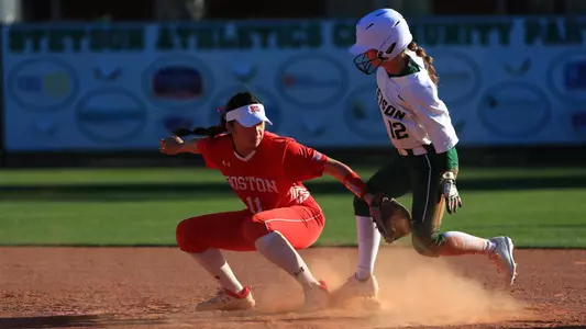 Patricia Dun tries to apply a tag to a Stetson runner at second base.