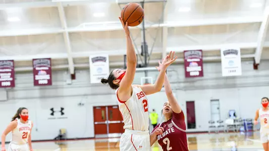 Riley Childs shooting a layup over a Colgate defender
