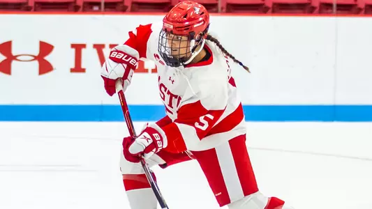 Courtney Correia shoots a puck