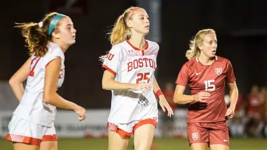 Claire Orson observes a play as she defends her Harvard foe.